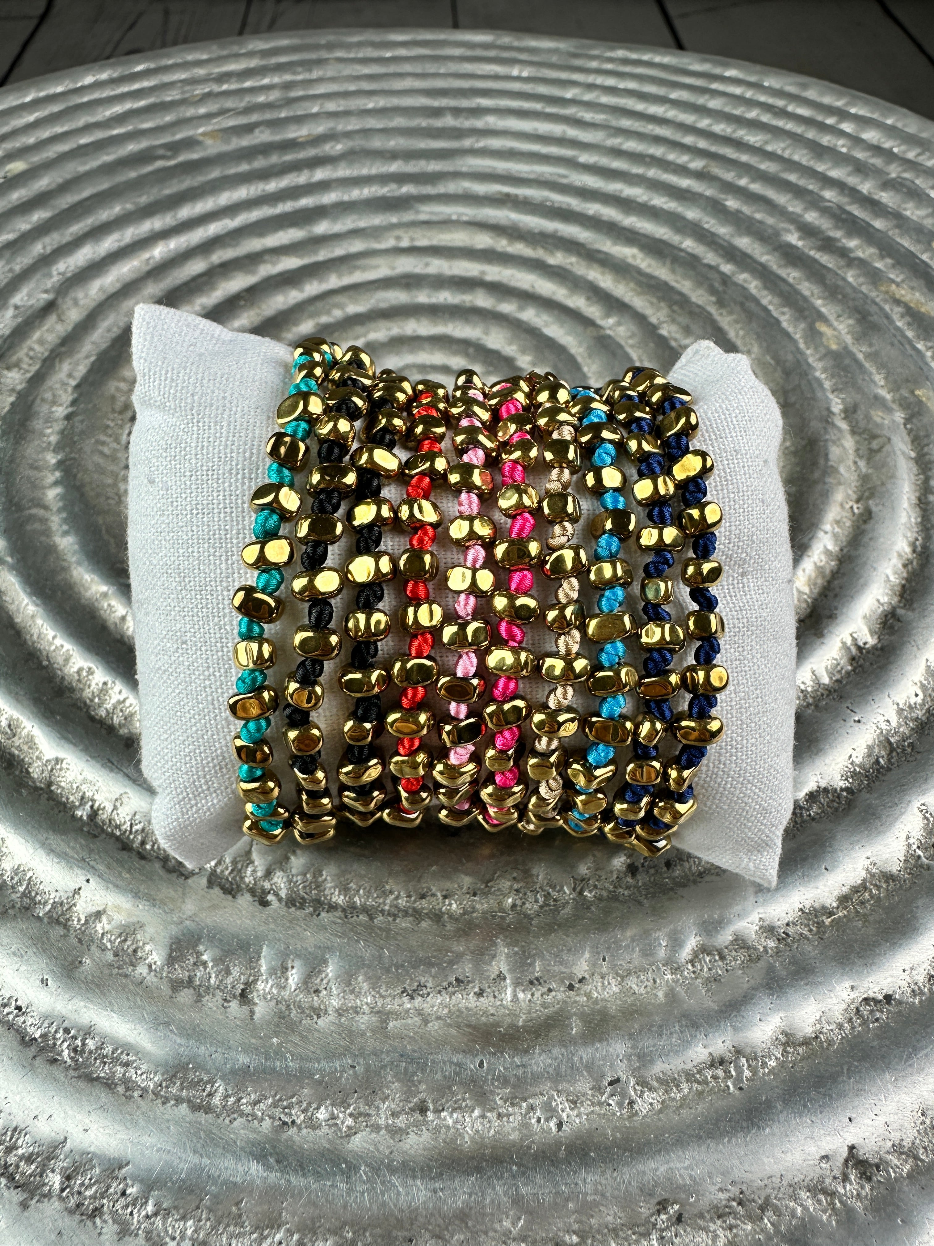 MOMI BRACCIALE SOLE ORO